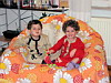 Twins on the sofa.